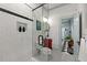 Stylish bathroom with glass shower, tiled floors, and rustic vanity at 7550 Fielder Rd, Jonesboro, GA 30236