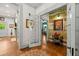 Hallway featuring hardwood floors, and access to multiple rooms at 7550 Fielder Rd, Jonesboro, GA 30236