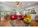 Inviting living room featuring hardwood floors, sliding barn doors, and lots of natural light at 7550 Fielder Rd, Jonesboro, GA 30236