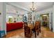 Open living area with built-in bookshelves flows into the dining room at 7550 Fielder Rd, Jonesboro, GA 30236