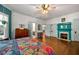Spacious main bedroom with ensuite bath, fireplace, and hardwood floors at 7550 Fielder Rd, Jonesboro, GA 30236
