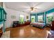 Spacious main bedroom with fireplace, large windows, and hardwood floors at 7550 Fielder Rd, Jonesboro, GA 30236