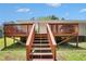 Multi-level wood deck and stairs in backyard at 10312 Waterford Ne Rd, Covington, GA 30014