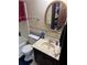 Bathroom featuring tub/shower combo, vanity, and mirror at 2513 Rockwood Way, Stone Mountain, GA 30087