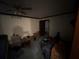 Bedroom with ceiling fan and clutter at 2513 Rockwood Way, Stone Mountain, GA 30087