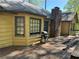 View of back deck with charcoal grill and mature trees at 2513 Rockwood Way, Stone Mountain, GA 30087