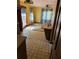 Cozy dining area with access to outdoor patio, natural light, and a ceiling fan at 2513 Rockwood Way, Stone Mountain, GA 30087