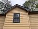 Close up view displaying the home's siding and detailing at 2513 Rockwood Way, Stone Mountain, GA 30087