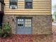Exterior back elevation with brick underpinning at 2513 Rockwood Way, Stone Mountain, GA 30087