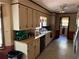 Functional kitchen featuring ample cabinet space, modern appliances, and tile flooring at 2513 Rockwood Way, Stone Mountain, GA 30087