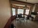 Eat-in kitchen featuring tile floors, window, and ample dining space at 2513 Rockwood Way, Stone Mountain, GA 30087