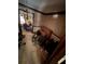 Cozy living room featuring vintage chandelier and comfortable seating area at 2513 Rockwood Way, Stone Mountain, GA 30087