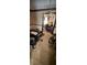Cozy living room featuring vintage chandelier and comfortable seating area at 2513 Rockwood Way, Stone Mountain, GA 30087