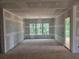 Unfinished room showing drywall and bright windows at 3435 Dr Bramblett Rd, Cumming, GA 30028
