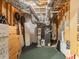 Utility space in basement with HVAC, water heater and open ceiling at 3580 Treeline Ne Pass, Roswell, GA 30075