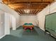 Finished basement space featuring pool table and ping pong table at 3580 Treeline Ne Pass, Roswell, GA 30075