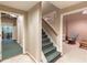 Basement with stairs and separate rooms, ideal for a workout area and relaxation space at 3580 Treeline Ne Pass, Roswell, GA 30075