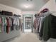 Large walk-in closet featuring built-in wire shelving for maximum storage at 3580 Treeline Ne Pass, Roswell, GA 30075