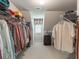 Walk-in closet boasts lots of storage space with wire shelving, a window and great lighting at 3580 Treeline Ne Pass, Roswell, GA 30075