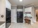 Modern kitchen with stainless steel appliances, granite counters, and ample storage at 3580 Treeline Ne Pass, Roswell, GA 30075