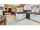 Bright kitchen with granite counters, white cabinets, and an open layout at 3580 Treeline Ne Pass, Roswell, GA 30075