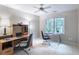 Bright office space with two desks, office chairs and a large window view at 3580 Treeline Ne Pass, Roswell, GA 30075