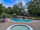 Sparkling pool and spa offer a luxurious outdoor retreat in this desirable community at 3580 Treeline Ne Pass, Roswell, GA 30075