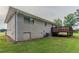 Side view of house showing basement door, and lush lawn at 2290 Pope Rd, Douglasville, GA 30135