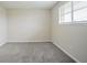Bedroom with neutral walls and carpet, featuring a window with blinds at 2290 Pope Rd, Douglasville, GA 30135