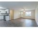 Open-concept living/kitchen space with new flooring, modern appliances, and plenty of natural light at 2290 Pope Rd, Douglasville, GA 30135