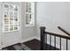 Bright entryway featuring a staircase and a view through a window to the outside at 2499 Barrett Preserve Sw Ct, Marietta, GA 30064