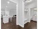 Hallway with view of mudroom-style storage area and bathroom in a modern house at 2499 Barrett Preserve Sw Ct, Marietta, GA 30064