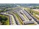 Aerial view of new residential community with modern homes, landscaping, and well-maintained streets at 2692 Pearl Ridge Trce, Buford, GA 30519