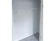 The minimalist closet has functional wire shelving and easy access for organizing belongings at 2692 Pearl Ridge Trce, Buford, GA 30519