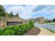 Welcome to Andover: A beautifully landscaped community entrance with lush greenery and modern homes at 2692 Pearl Ridge Trce, Buford, GA 30519