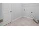 Functional laundry area with tile floor and hookups at 2692 Pearl Ridge Trce, Buford, GA 30519