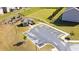A parking lot next to a community gazebo with parking and grassy hill beyond at 2692 Pearl Ridge Trce, Buford, GA 30519
