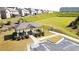 Community pavilion with picnic tables, landscaping, and a staircase to a grass hill at 2692 Pearl Ridge Trce, Buford, GA 30519