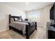 Bedroom featuring plush carpeting and a dresser at 320 Conley Ave, Hampton, GA 30228