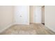 Bedroom featuring plush carpeting and a double-door closet at 320 Conley Ave, Hampton, GA 30228