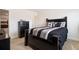 Bedroom featuring plush carpeting and a dresser at 320 Conley Ave, Hampton, GA 30228