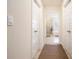 Hallway to the bathroom with a tub shower combo at 320 Conley Ave, Hampton, GA 30228