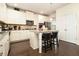 Contemporary kitchen featuring an island with seating and sleek, stainless steel appliances at 320 Conley Ave, Hampton, GA 30228