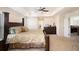Spacious main bedroom featuring a large bed, large dressers and recessed lighting at 320 Conley Ave, Hampton, GA 30228
