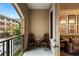 Cozy balcony with seating and a view of surrounding buildings at 3621 Vinings Slope Se # 1231, Atlanta, GA 30339