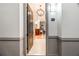 Welcoming entryway with tile flooring, chandelier lighting, and a view into the living area at 3621 Vinings Slope Se # 1231, Atlanta, GA 30339