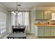 Charming eat-in kitchen nook with pendant lighting and adjacent to the kitchen at 1001 Pine Ridge Dr, Stone Mountain, GA 30087