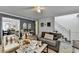 Cozy living area with neutral tones, ample seating, and decorative accents at 1001 Pine Ridge Dr, Stone Mountain, GA 30087