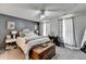 Relaxing main bedroom with a comfortable bed, plush carpeting, and natural light from bright windows at 1001 Pine Ridge Dr, Stone Mountain, GA 30087