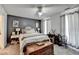 Cozy main bedroom features stylish decor, soft carpeting, and bright windows at 1001 Pine Ridge Dr, Stone Mountain, GA 30087